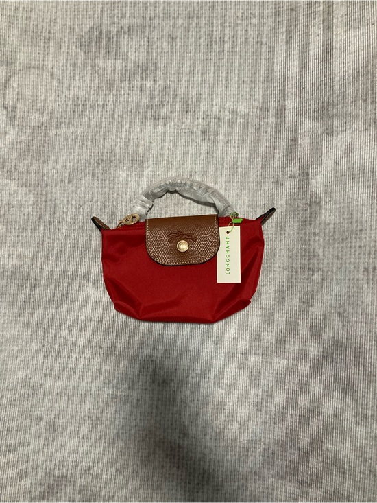 Longchamp Handbags - Longchamp Red Mini Pouch with Brown Trim and Gold Hardware